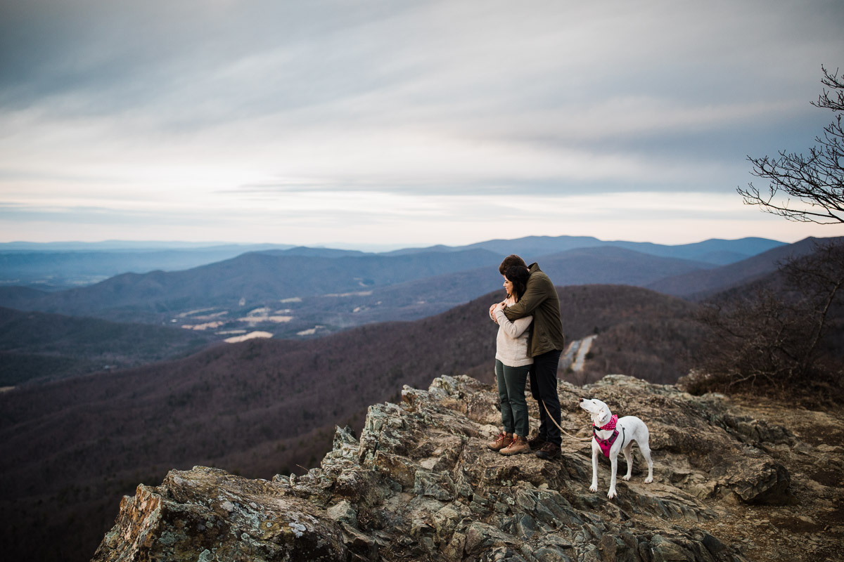 Vicki, Stephen and their pup enjoying the sunset at Little Stony Man hike on Skyline Drive of Shenandoah National Park.