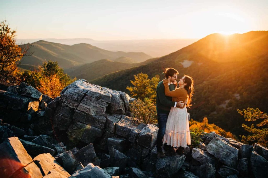 A couple snuggles during their Shenandoah National Park engagement session