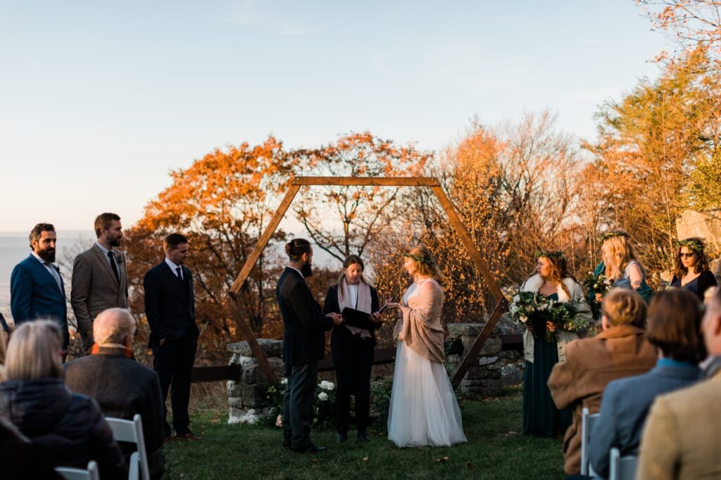 A couple stands during their wedding ceremony at Skyland Resort
